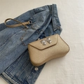 Sparkling gold sequin crossbody bag with a metallic silver bow and chain strap - Gold