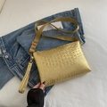 Golden crocodile embossed crossbody bag with adjustable fabric strap and gold hardware - Gold