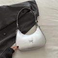 Silver metallic crescent hobo bag with adjustable strap and decorative silver bow buckle - Silver