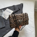Retro leopard print shoulder bag with metal chain strap and studded buckle closure - Brown