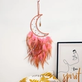 Bohemian moon dreamcatcher featuring warm orange woven mesh and soft gradient feathers - Moon Style