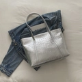 Silver crocodile embossed tote bag with dual handles and metallic finish on white fabric - Silver