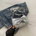 Metallic silver ruched underarm bag with large bow detail and pleated strap - Silver