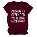 Detail of soft maroon cotton fabric with facts and logic quote print and rolled sleeves - Wine Red (White Font)