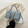 Light blue structured square handbag with gold buckle and matching mini coin purse charm - Blue