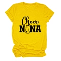 Macro shot of Cheer NANA typography and megaphone graphic on yellow cotton T-shirt - Yellow (Black Font)
