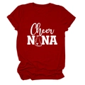 Close-up of Cheer NANA printed graphic on a deep red crew neck cotton blend t-shirt - Red (White Font)
