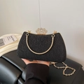 Detail of black sequined evening bag with golden frame and rhinestone crown clasp - Black