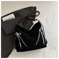 Black tote bag with brown straps, dual silver zippers and silver bow accents - Black