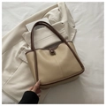 Detail of beige tote bag with brown leather trim and retro single buckle closure - With Pendant / Dark Khaki