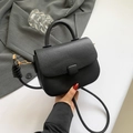 Schwarze Handtasche aus Leder mit Lychee-Muster und Umhängeriemen für elegante Damen - Schwarz