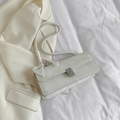 Elegante borsa sottobraccio beige con trama litchi e manico decorativo in seta - Bianco