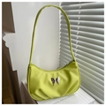 Detail of lime green ruched shoulder bag with silver butterfly ornament and zipper - Green