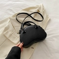 Minimalistische schwarze Halbmond-Handtasche mit rundem Griff und abnehmbarem Gurt - Schwarz
