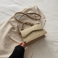 Beige straw woven crossbody bag with floral embroidery and knotted handle detail - Khaki