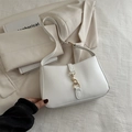 White minimalist leather half-moon underarm bag with gold metal buckle detail - White