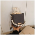 Chic dark grey bucket bag with large pearl handle and adjustable drawstring closure - Black