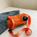 Orange nylon cylinder sports crossbody bag with wide strap and fuzzy charcoal charm - With Pendant / Orange