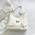 Borsa a spalla bianco crema con fibbia a farfalla argentata e dettagli a fiocco - Bianco
