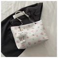 Borsa tote in jacquard bianco con fiori rosa, fiocchi e tracolla a catena - Con Ciondolo / Bianco