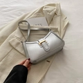 Silver crescent shoulder bag with metallic finish and gold rectangular clasp - Silver