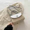 Bolso bandolera de paja tejida con solapa de cuero plateado y cierre giratorio - Plateado