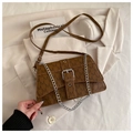 Detail of caramel brown crossbody bag with M-letter pattern and silver metal chain strap - Brown
