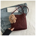 Vintage burgundy leopard print suede bucket bag with a cute plush dog charm - With Charm / Red