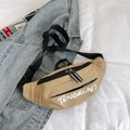 Khaki canvas fanny pack with TENGRUN7 logo and reflective zippers on denim backdrop - Khaki