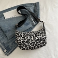 Fashionable black and white leopard print crossbody bag with adjustable black strap - Leopard White