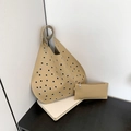 Borsa a secchiello kaki con occhielli in metallo argento e portamonete coordinato - Cachi