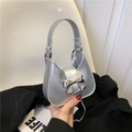 Silver mirror finish shoulder bag with trendy 3D bow decoration and chain strap - Silver