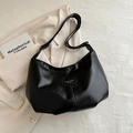 Fashionable black soft faux leather hobo shoulder bag with adjustable strap and zip closure - Black