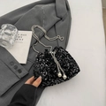 Black sequin bucket bag with silver chain strap and pearl drawstring details - Black