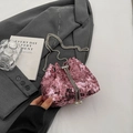 Chic pink sequin bucket bag with silver chain strap and pearl drawstring details - Pink