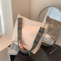 Cream large tote bag with vintage patterned wide strap and matte leather texture - White