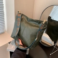 Dark green faux leather tote bag with wide geometric patterned strap and gold hardware - Green