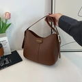 Vintage brown leather bucket bag for women with fashion label and adjustable shoulder strap - Without Pendant / Brown