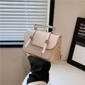 Chic beige crossbody handbag with golden hardware and vintage British style aesthetics - Off White