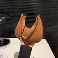 Brown leather crescent shoulder bag with golden metal hardware and sleek minimal design - Brown
