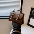 Retro brown leather crossbody bag with vintage gold buckle and top handle details - Brown