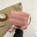Chic light pink quilted shoulder bag featuring a soft padded flap and nylon texture - Pink
