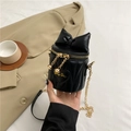 Mini black leather bucket bag with large bow and gold chain strap for stylish women - Black