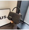 Detail of black sequined flap on PU leather handbag with golden square buckle - Black