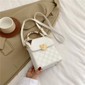 White mini crossbody bag with embossed checkerboard and gold heart lock detail - White
