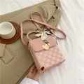 Pink crossbody bag with gold heart lock and checkered texture featuring silk scarf handle - Pink