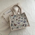 Retro-Shopper mit Schmetterlings-Jacquard, Seilgriffen und bunten Mustern aus Segeltuch - Beige