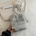 Silver pleated bucket bag with metallic drawstring design and leather shoulder straps - Silver