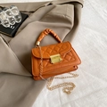 Caramel orange quilted crossbody bag with gold chain strap and ruched top handle - Brown