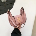 Pink crescent shoulder bag with gold SS logo and tassel detail in smooth PU leather - Pink
